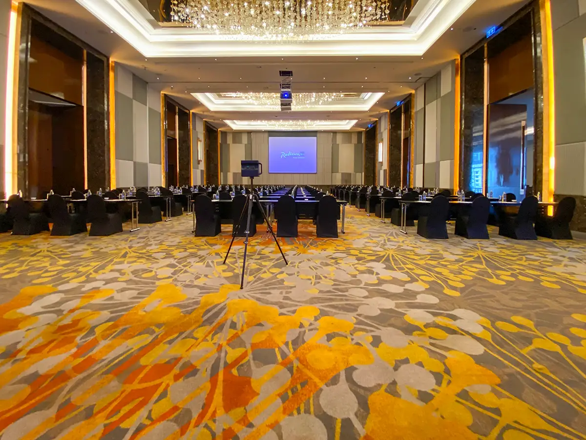 Adostrophe scanning at a corporate event space in Bangkok.