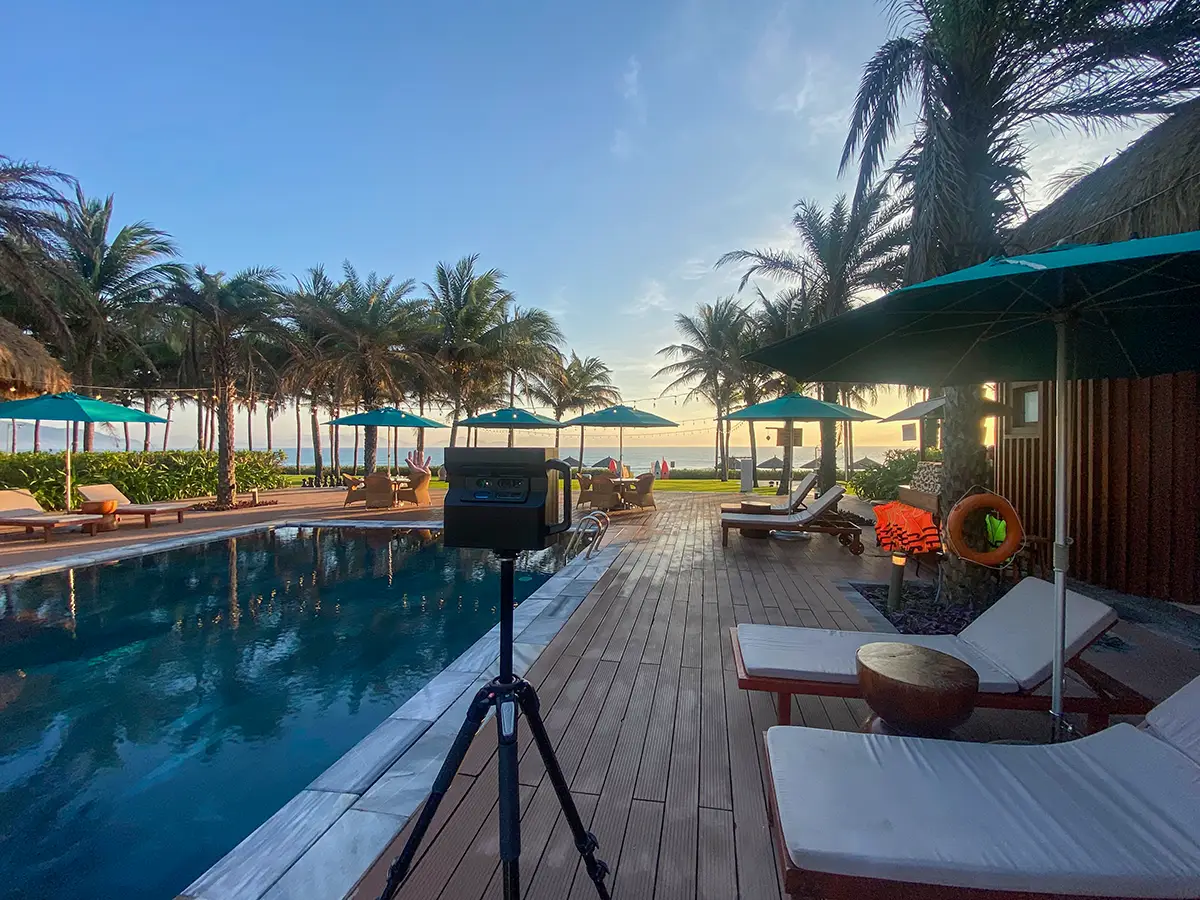 An immersive, high-definition digital twin view of a luxury hotel suite with an ocean view, showcasing the detail of Matterport technology.