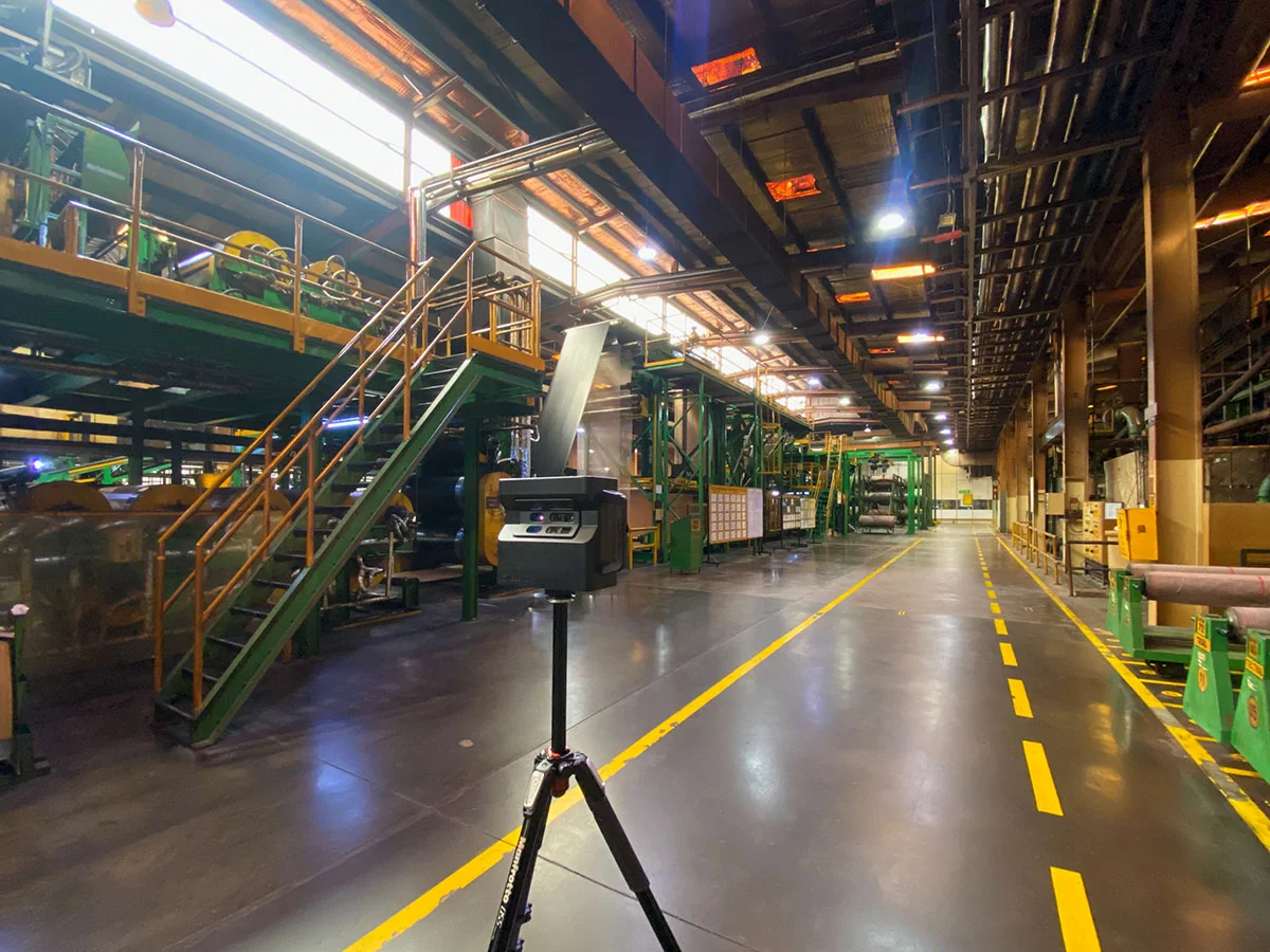 Matterport Pro2 positioned near heavy extruder machinery