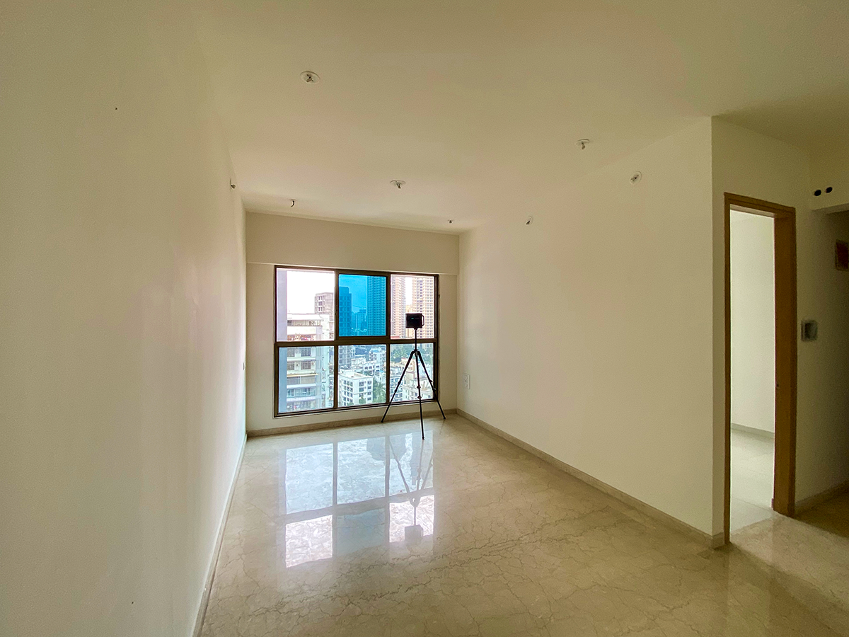 A Matterport camera scanning a modern home, symbolizing the Mumbai real estate market.