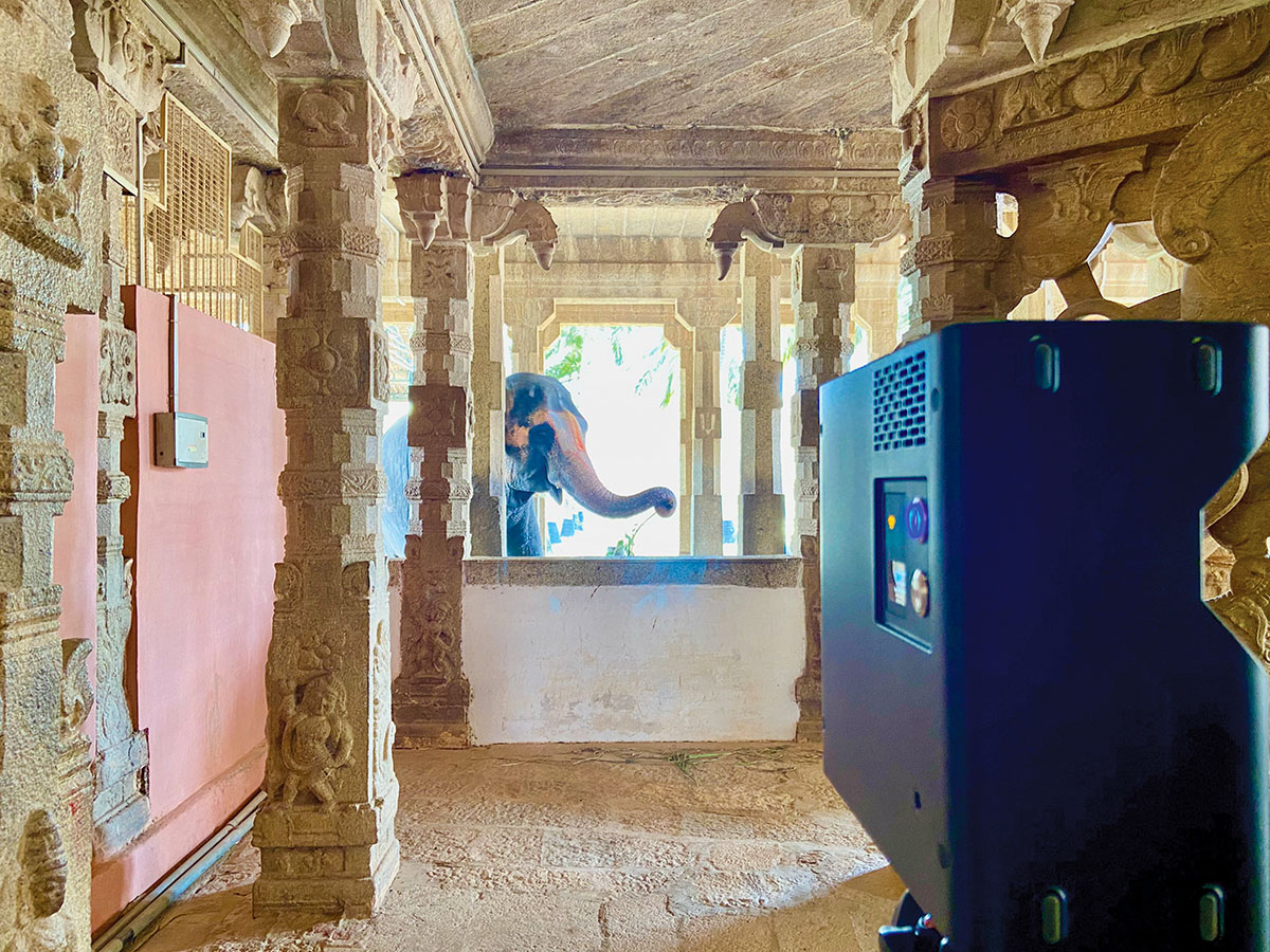 Matterport Pro2 capturing a temple corridor alongside a resident temple elephant.