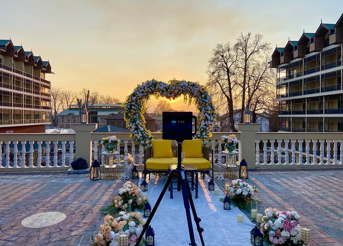 A Matterport camera creating a digital twin of a luxury hotel poolside in India.