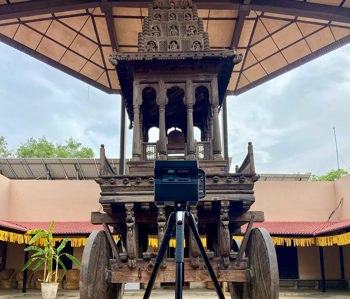 A museum interior with ancient artifacts displayed in cases, made accessible through a virtual tour.