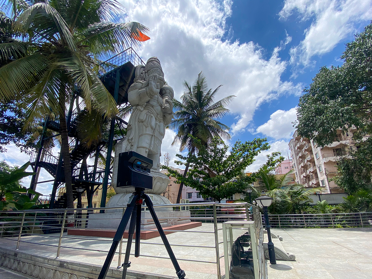 The Matterport Pro2 camera set up respectfully inside a serene temple, ready to begin the digital preservation process.