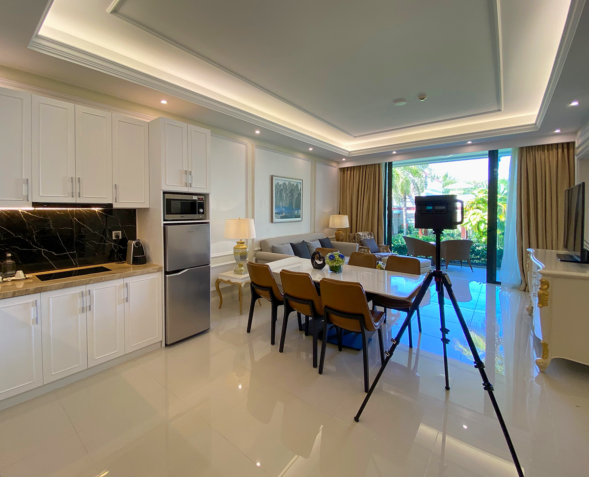 Real estate agent conducting a virtual showing with a client on a tablet