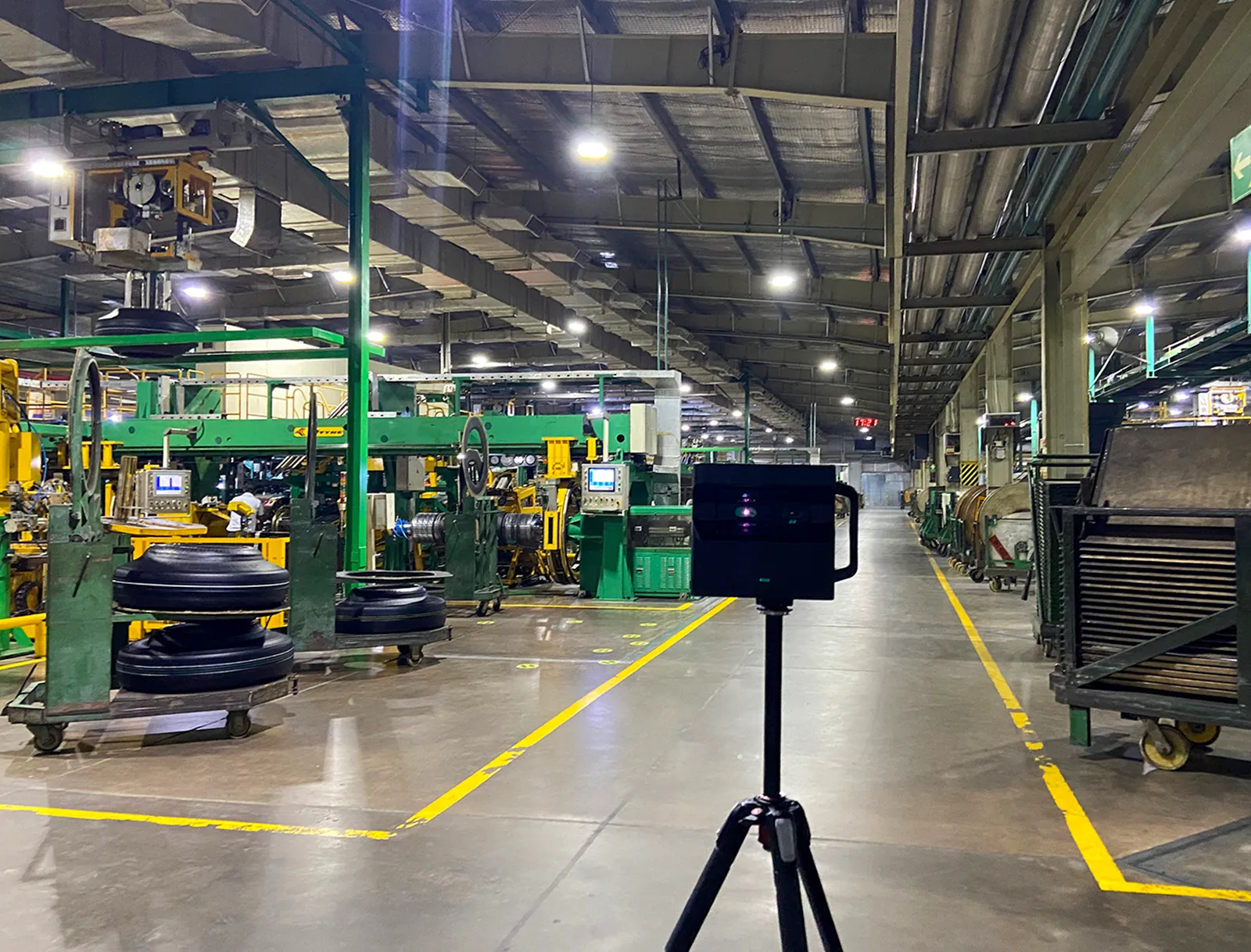 The Matterport Pro2 on a tripod on the live plant floor at JK Tyre.